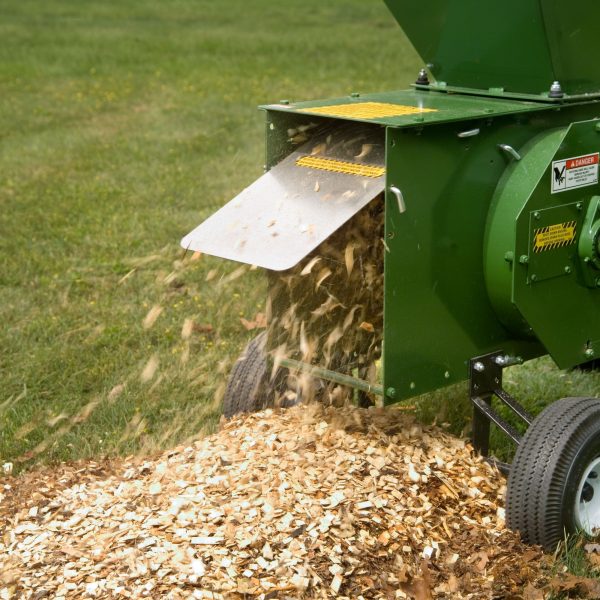 Wood Chips coming out of Mighty Mac Hammermill Shredder-Chipper