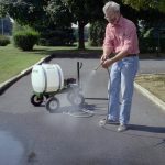 Mighty Mac 22 Gallon Sprayers cleaning driveway