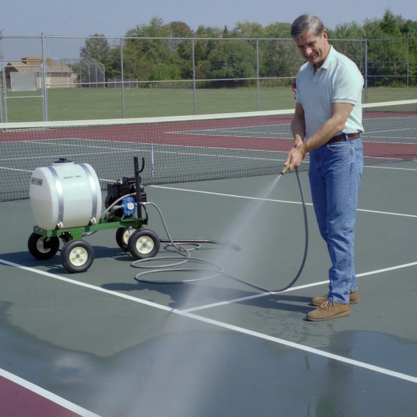 A Mighty Mac 22 Gallon Sprayer being used to clean a tennis court