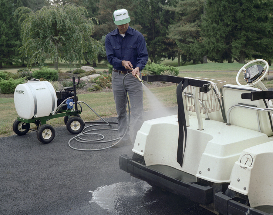 Mighty Mac PS322T 22 Gallon Sprayer cleaning a golf cart
