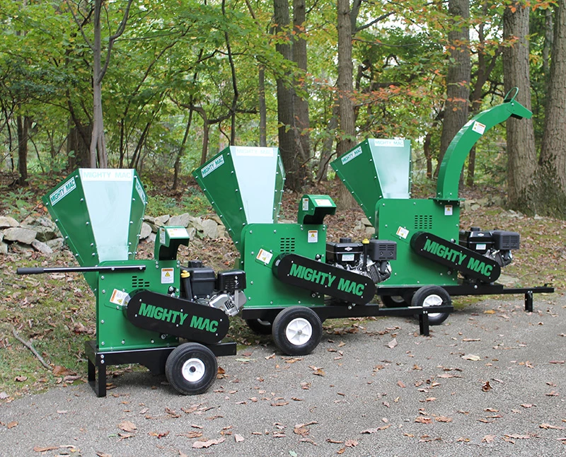 three mackissic residential wood chippers modeled in a line